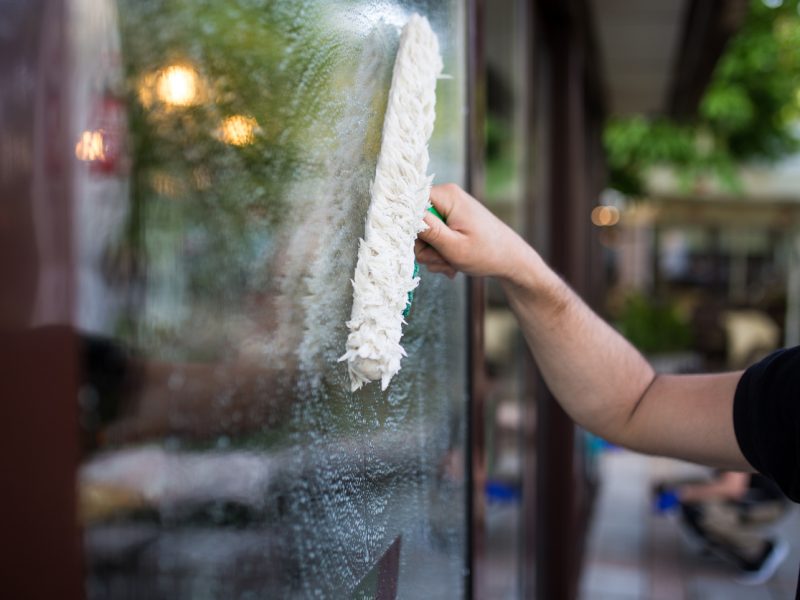 Window cleaner on his job